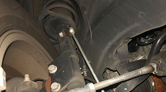 Worn struts on the front end of a car need to be replaced
