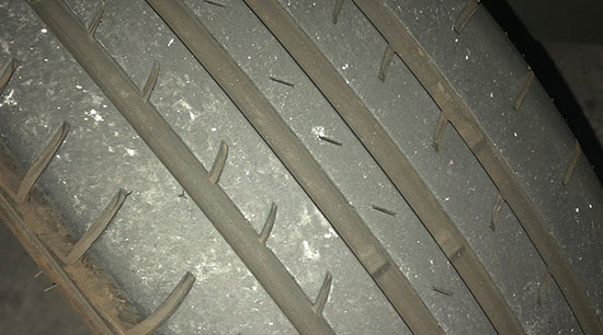 Uneven tire wear caused by failing shock absorbers and struts