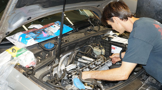 Audi Volkswagen mechanic shop valve cover gasket repair
